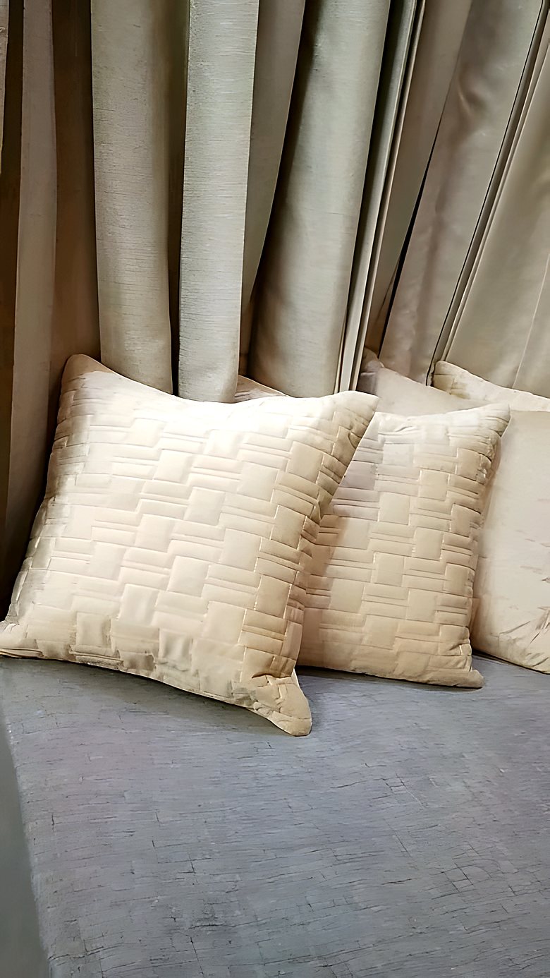 Quilted ivory cushion covers