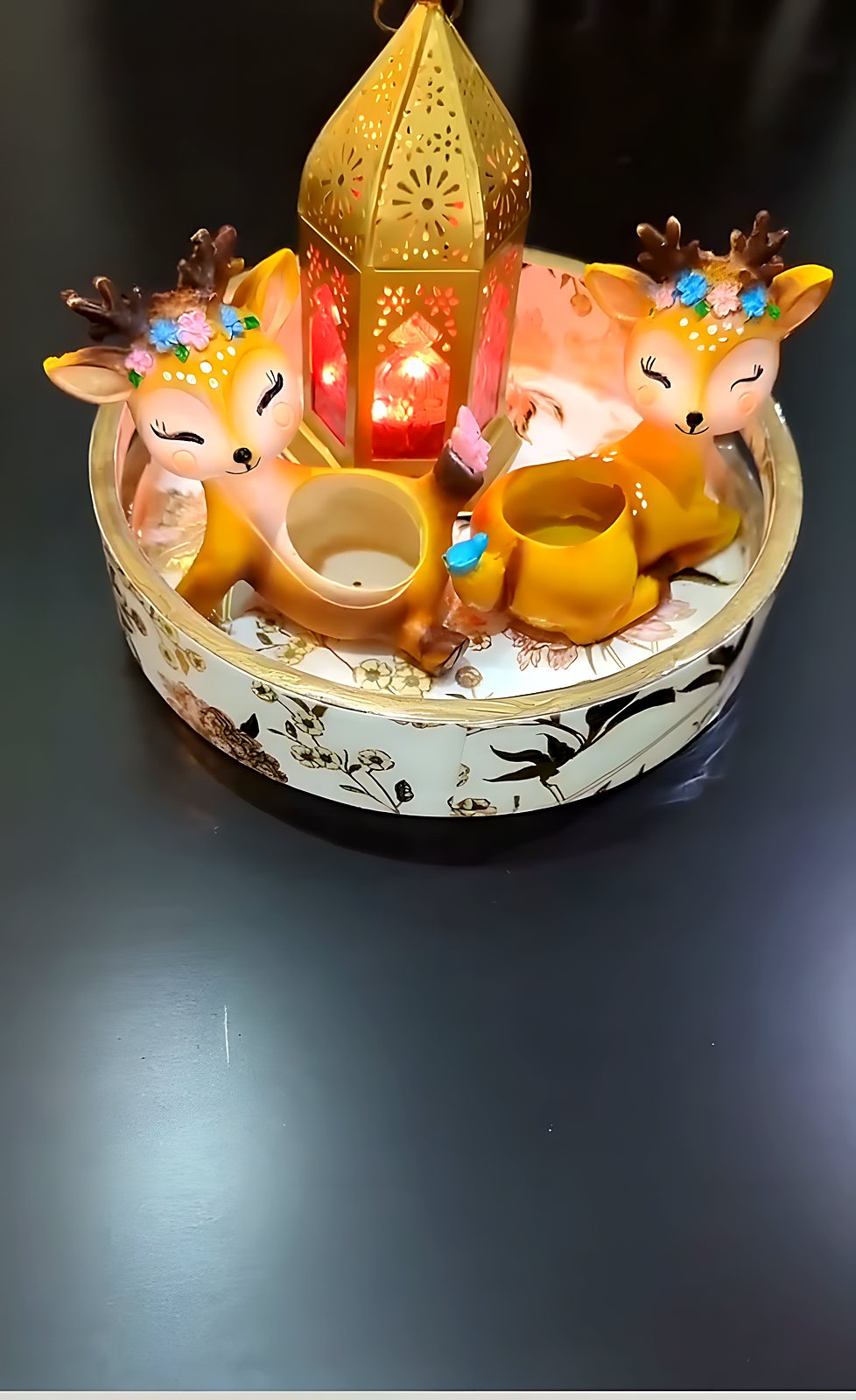 Printed wooden tray styled with a lantern and festive décor